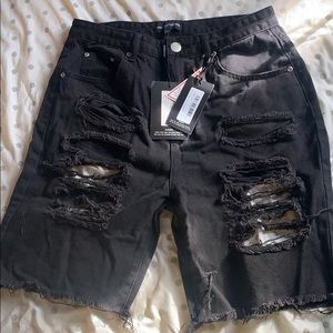 Black extreme distressed denim